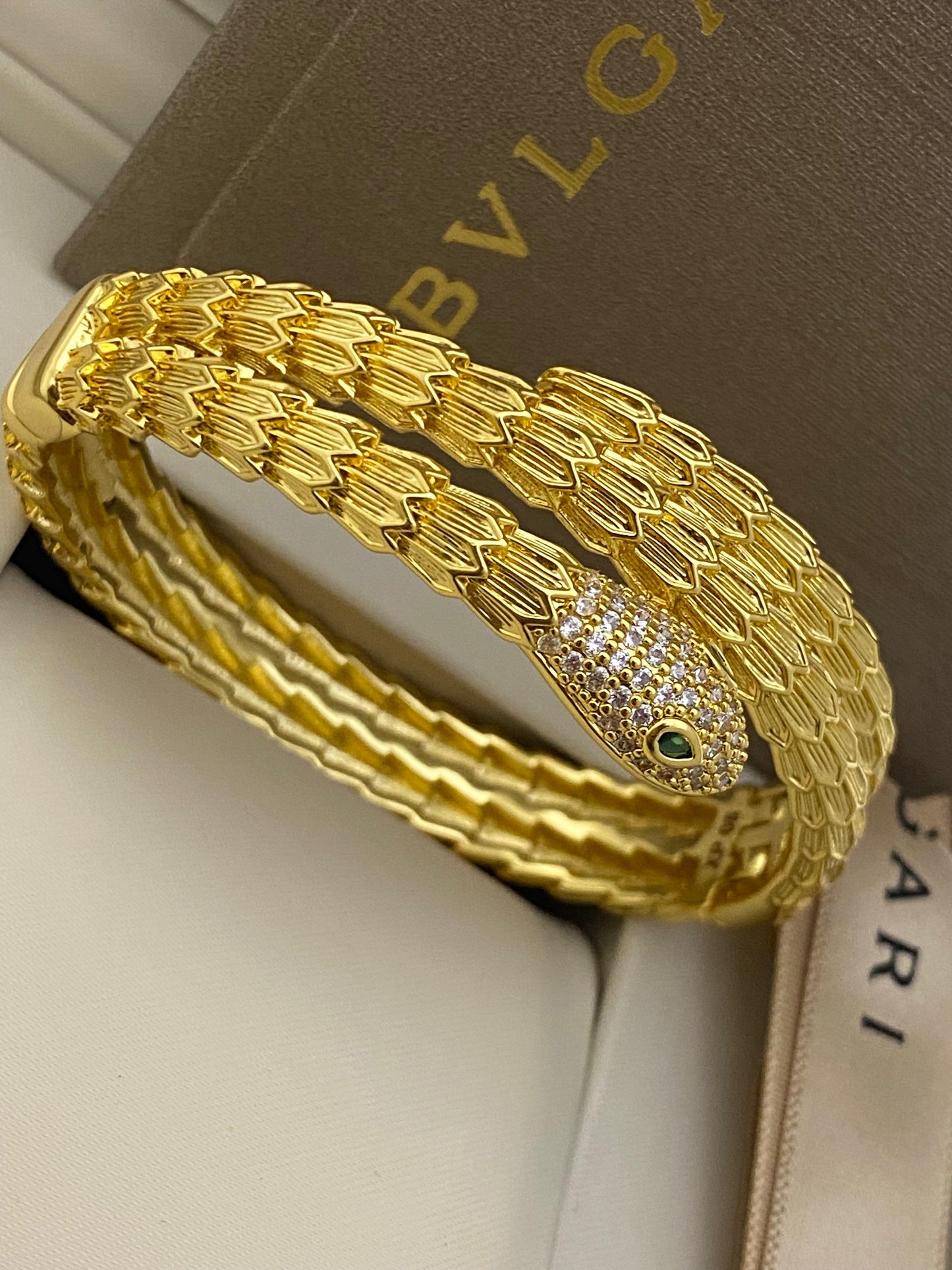 Gold-Tone Serpent Wrap Bangle with Crystal Pave Head & Emerald-Color Eyes