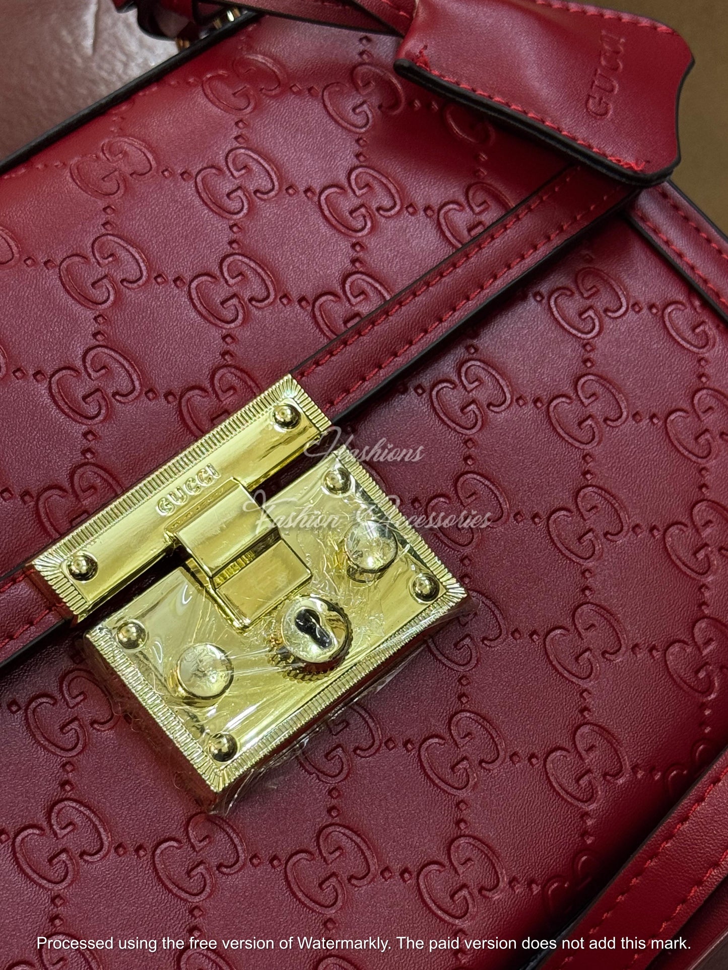 Monogram Embossed Leather Top-Handle Bag