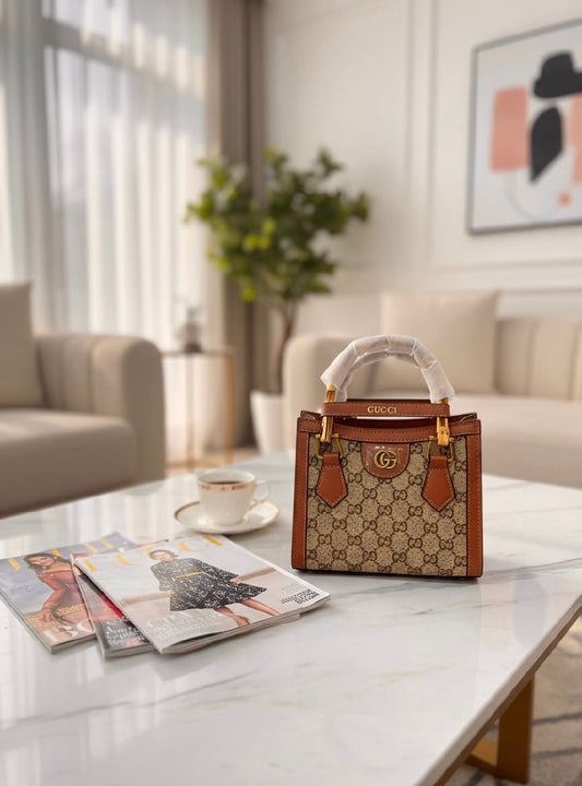 Luxury Monogram Bamboo Handle Bag – Structured Canvas Design