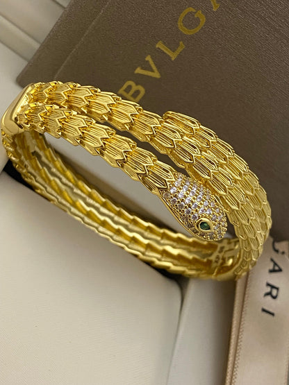 Gold-Tone Serpent Wrap Bangle with Crystal Pave Head & Emerald-Color Eyes