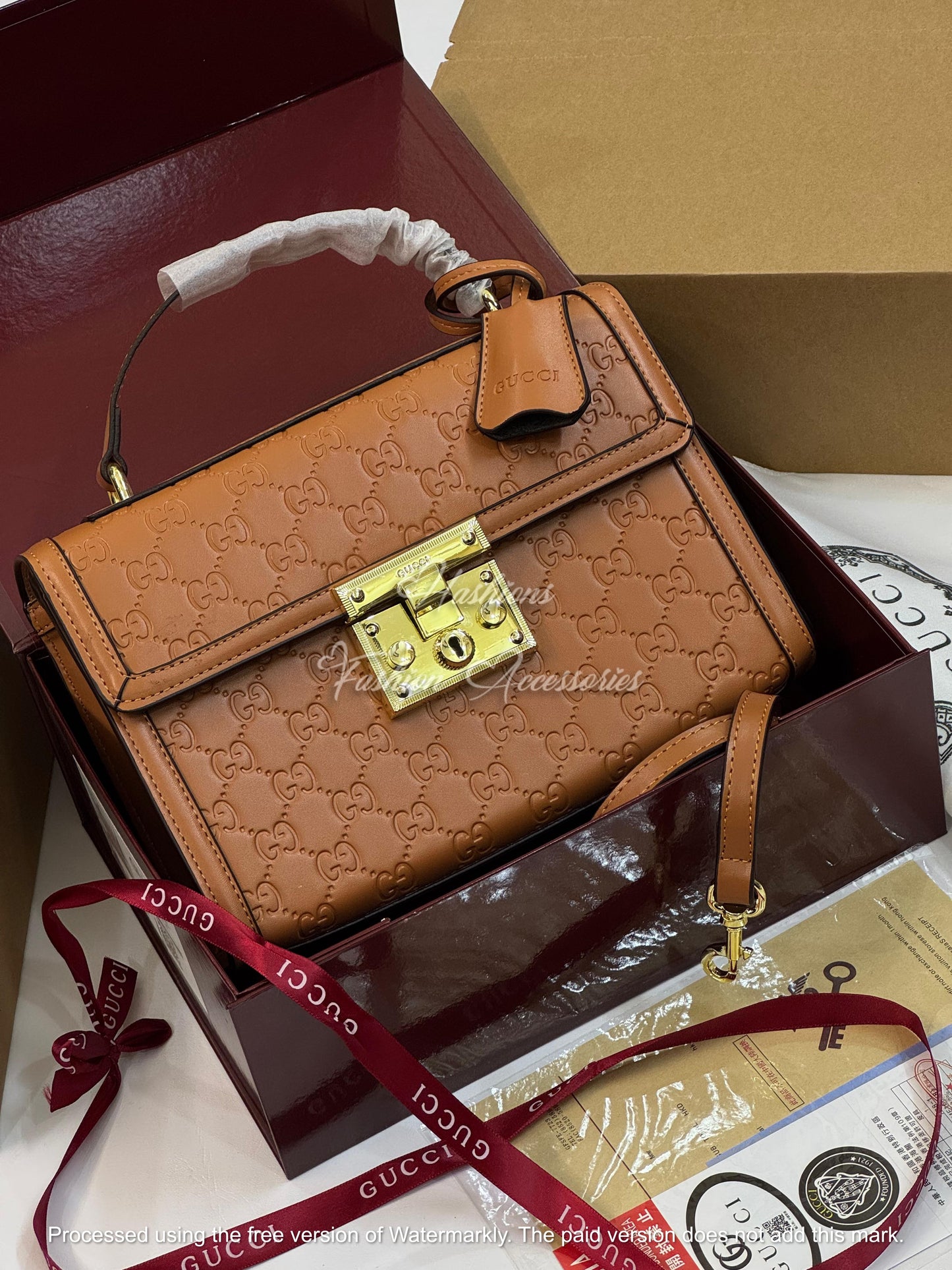 Monogram Embossed Leather Top-Handle Bag