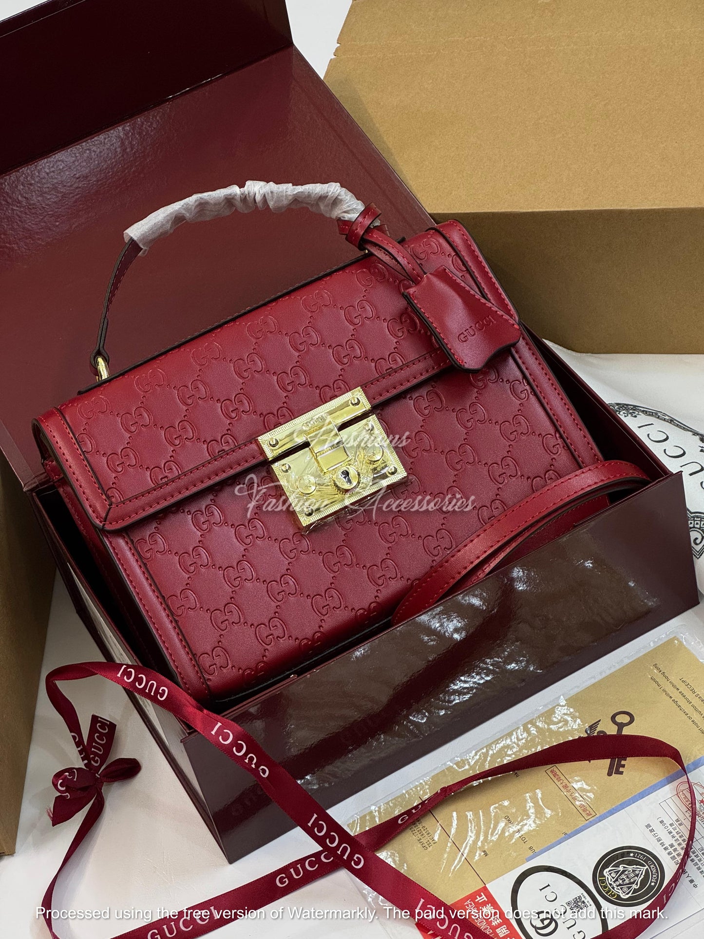 Monogram Embossed Leather Top-Handle Bag