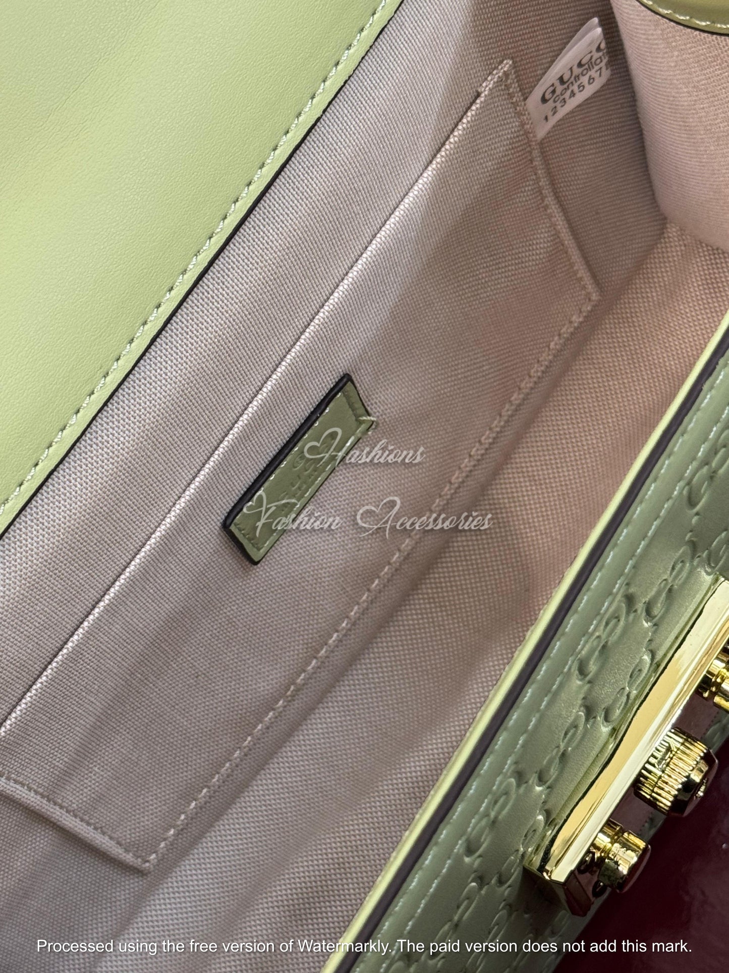 Monogram Embossed Leather Top-Handle Bag