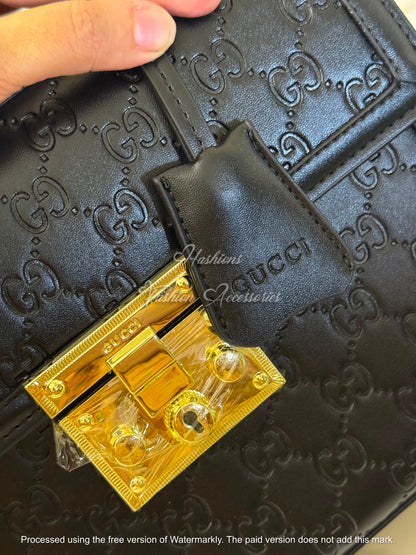 Monogram Embossed Leather Top-Handle Bag