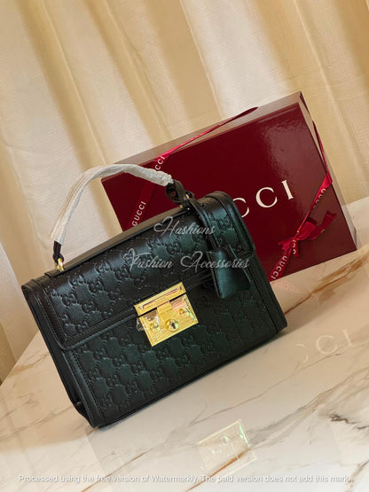 Monogram Embossed Leather Top-Handle Bag