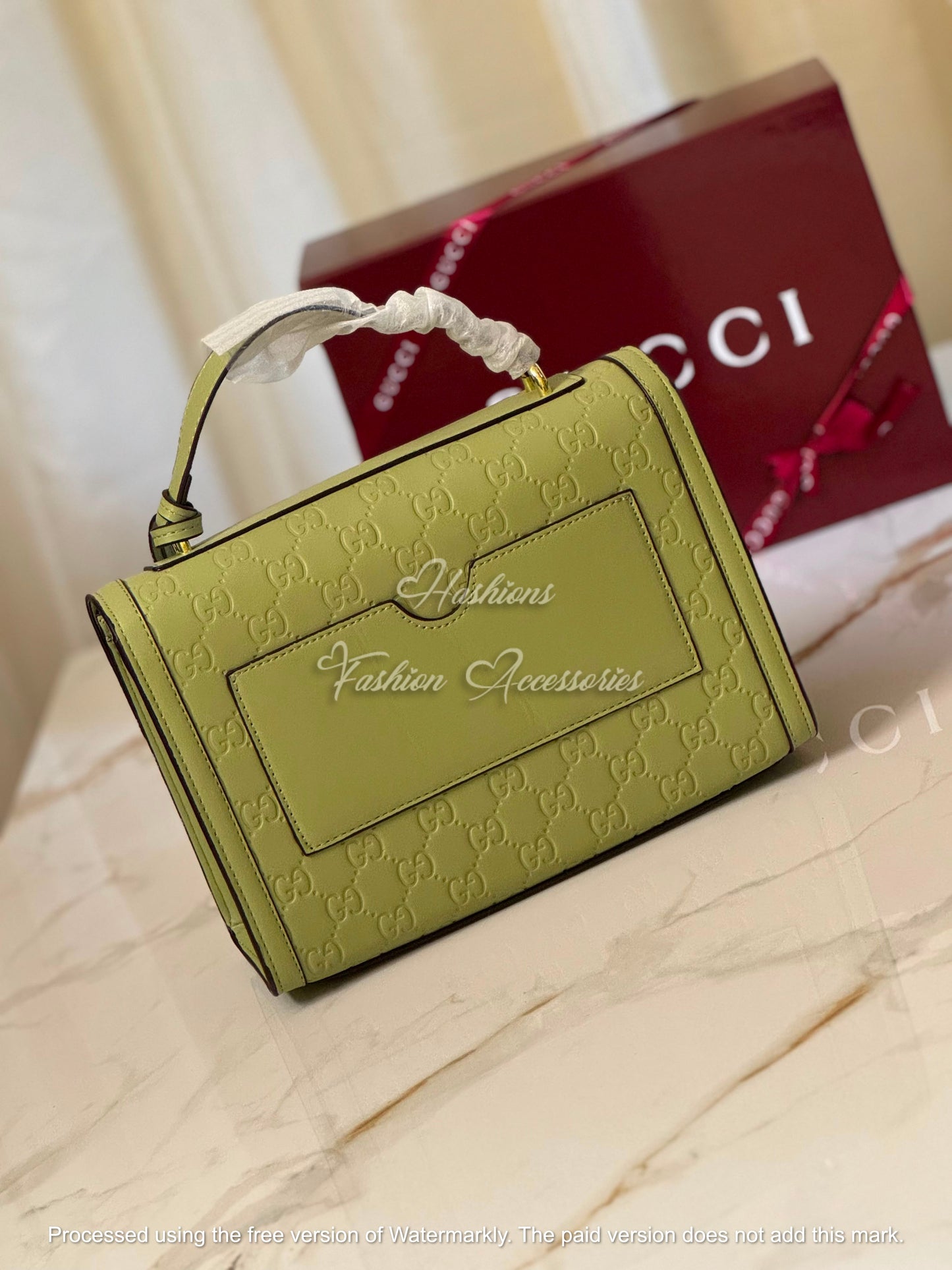 Monogram Embossed Leather Top-Handle Bag
