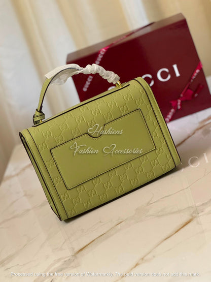 Monogram Embossed Leather Top-Handle Bag