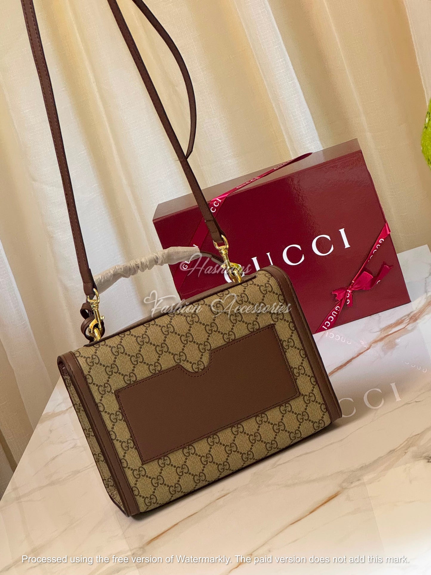 Monogram Embossed Leather Top-Handle Bag