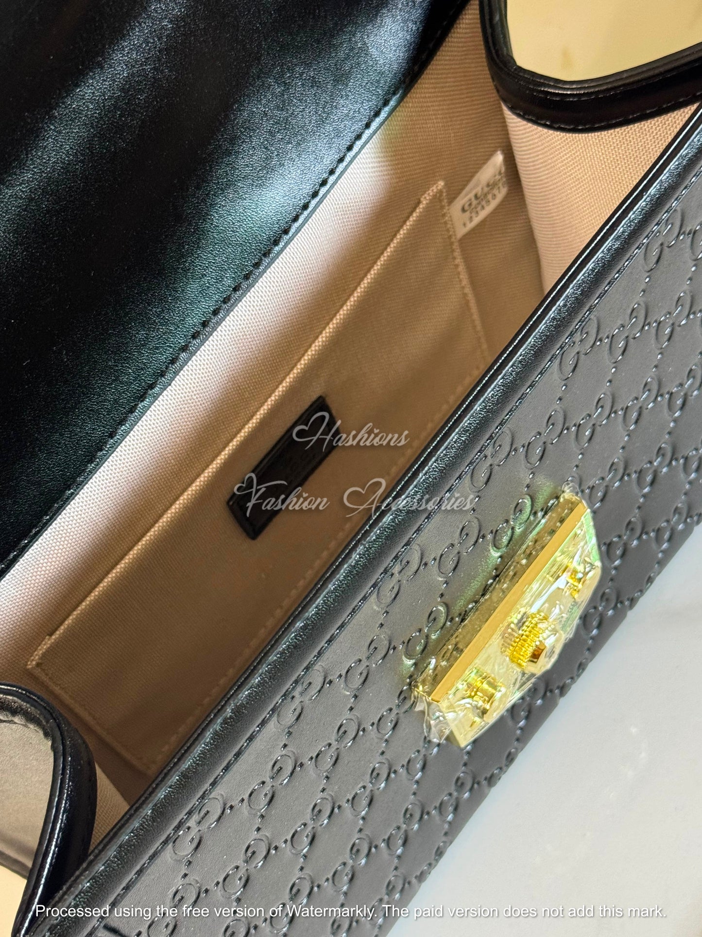 Monogram Embossed Leather Top-Handle Bag